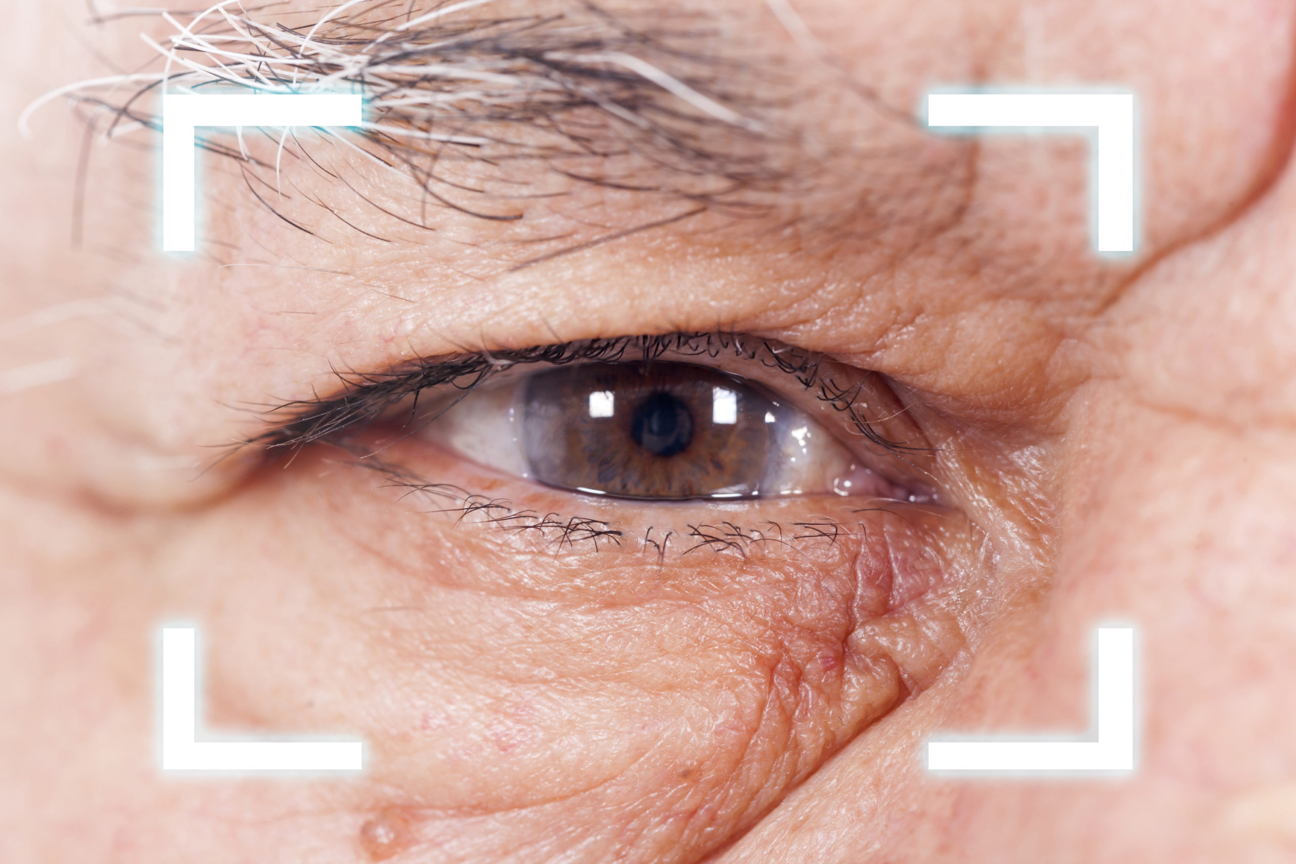close-up-of-old-mans-eye-high-technologies-in-the-future