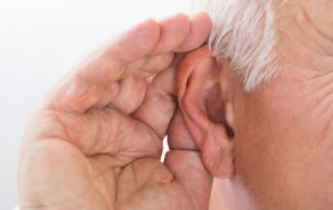 close-up-of-a-man-trying-to-hear
