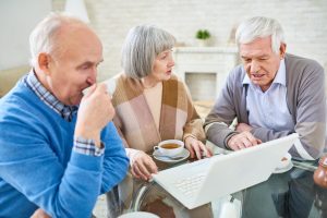 elderly-patients-using-laptop-together